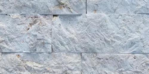 Piedra Escarfilada Crema